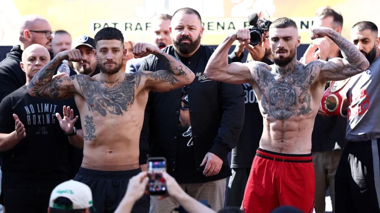 Two boxers flexing muscles at weigh-in event Two boxers flexing muscles at weigh-in event
