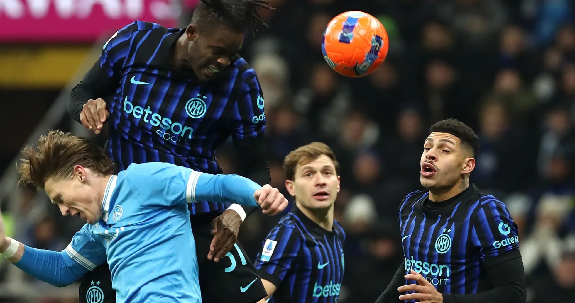 Player heading the ball during a match action Player heading the ball during a match action