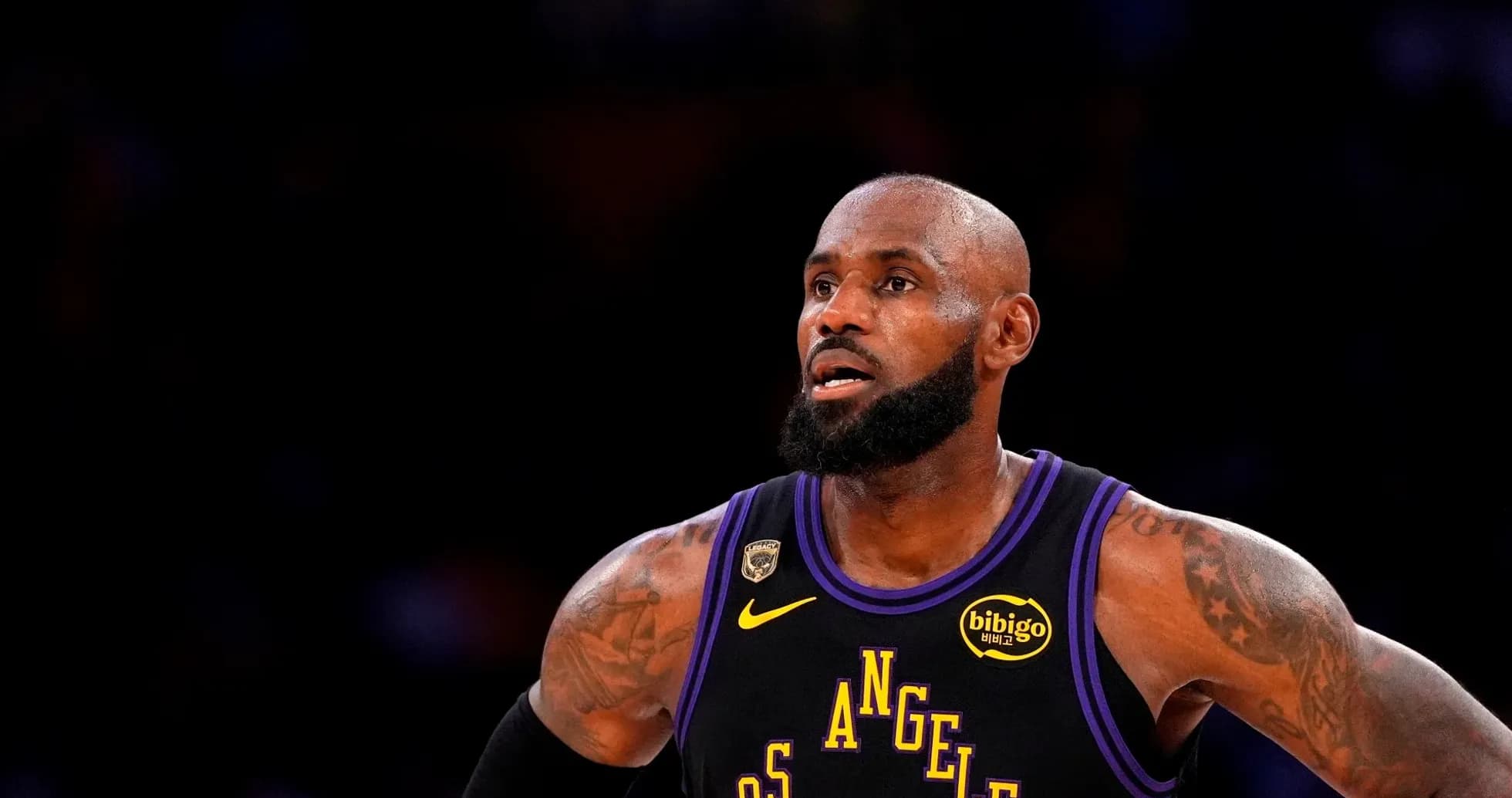 Basketball player wearing Los Angeles Lakers jersey Basketball player wearing Los Angeles Lakers jersey