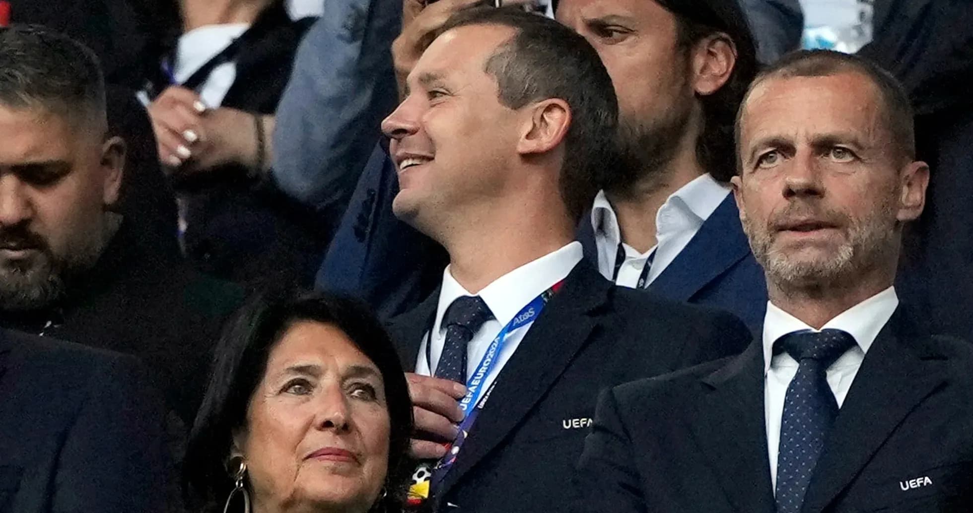 Officials watching the match in the stands Officials watching the match in the stands