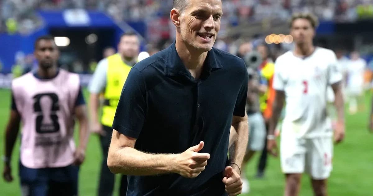 Coach walking on the pitch after the match Coach walking on the pitch after the match