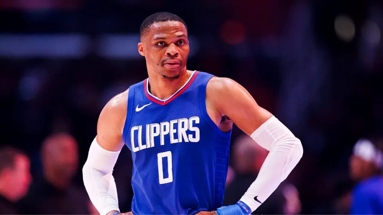 Basketball player in Clippers jersey during game Basketball player in Clippers jersey during game