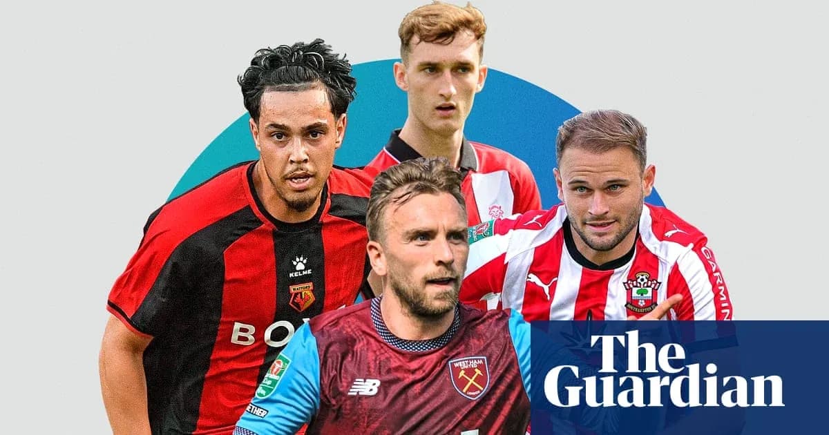Four football players from different teams in action Four football players from different teams in action