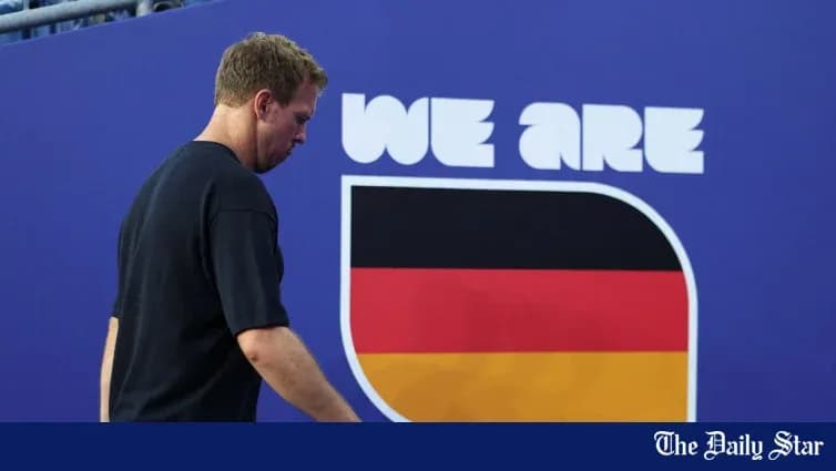 Tennis player walking past German flag backdrop Tennis player walking past German flag backdrop