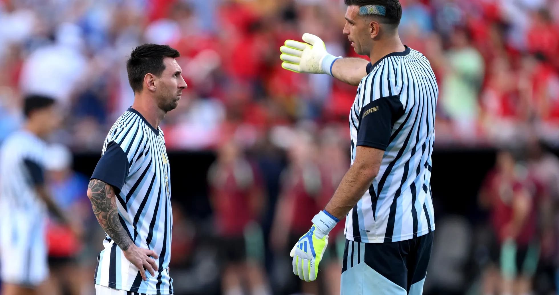 Lionel Messi and goalkeeper discussing on the field Lionel Messi and goalkeeper discussing on the field