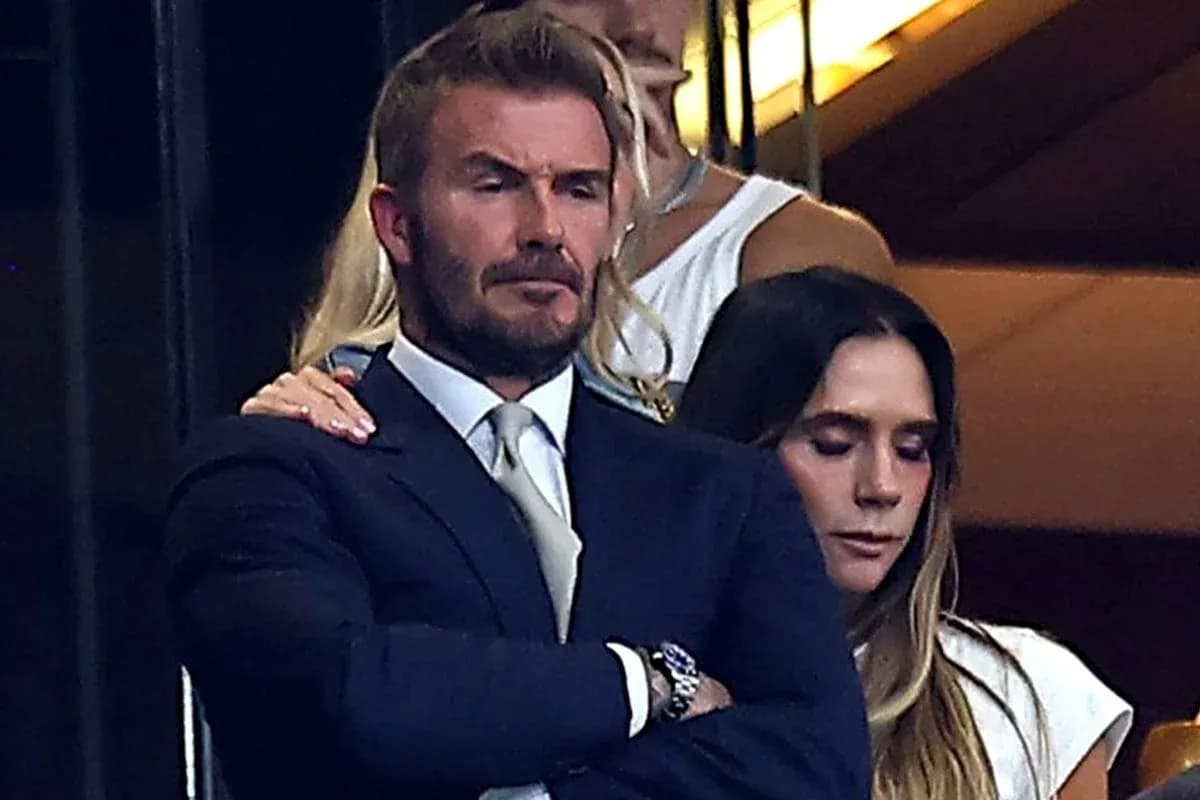 David Beckham and Victoria Beckham at an event David Beckham and Victoria Beckham at an event