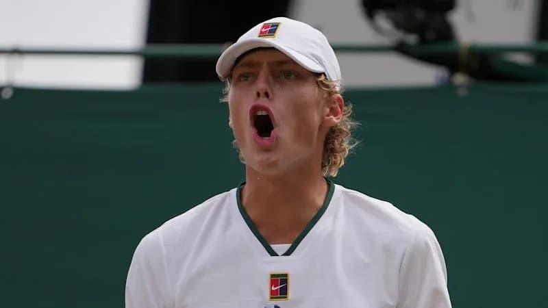 Tennis player shouting during a match Tennis player shouting during a match