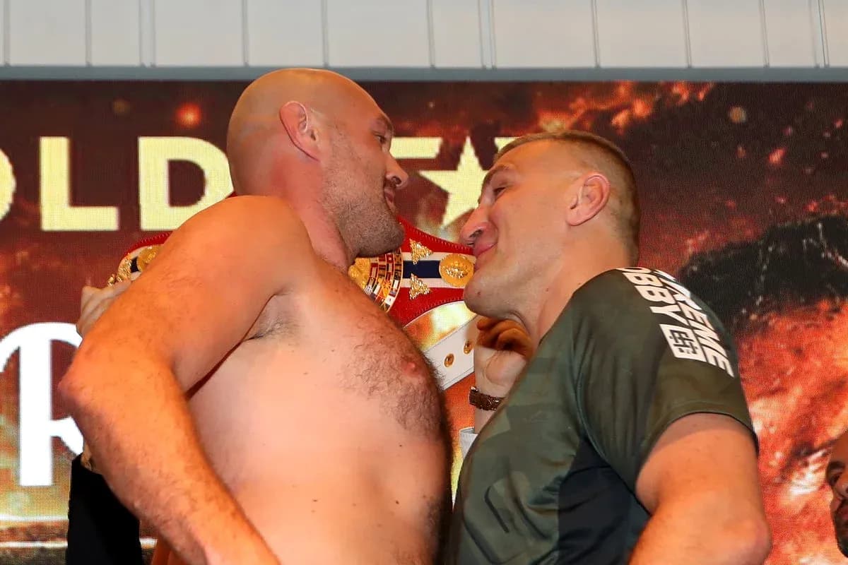 Boxers facing off during weigh-in event Boxers facing off during weigh-in event
