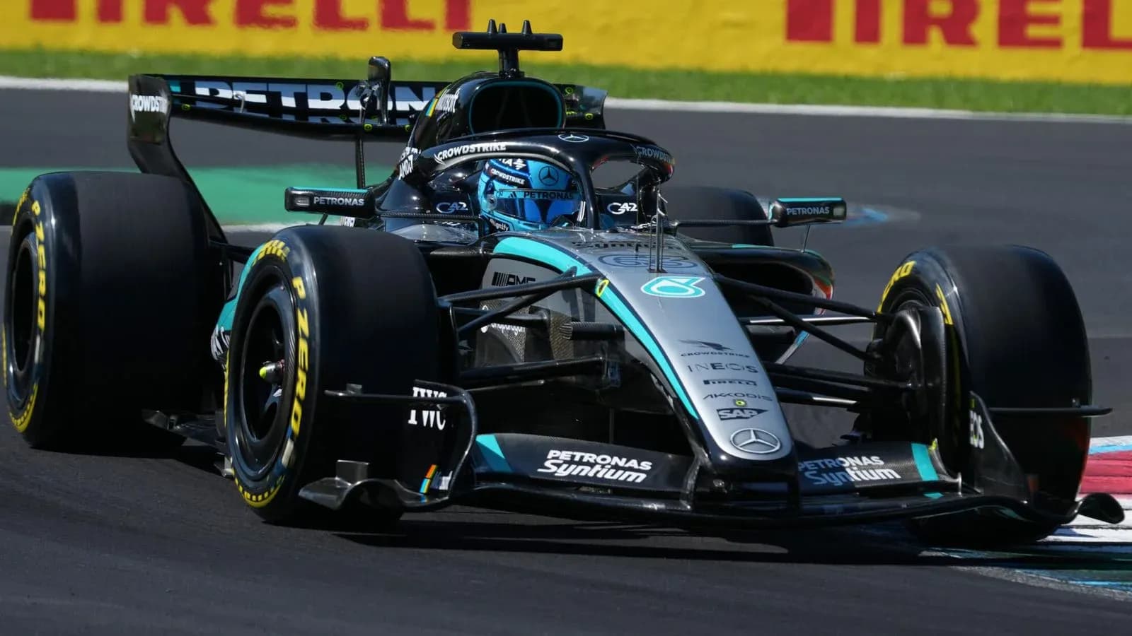 Formula 1 car racing on track during event Formula 1 car racing on track during event