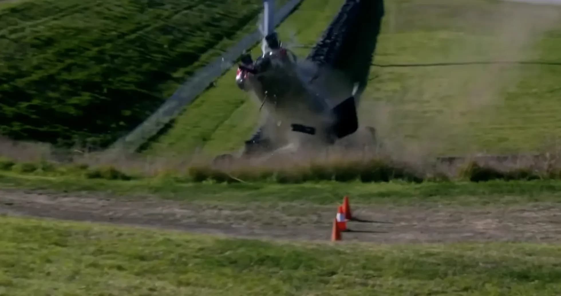 Helicopter losing control and crashing on hillside Helicopter losing control and crashing on hillside