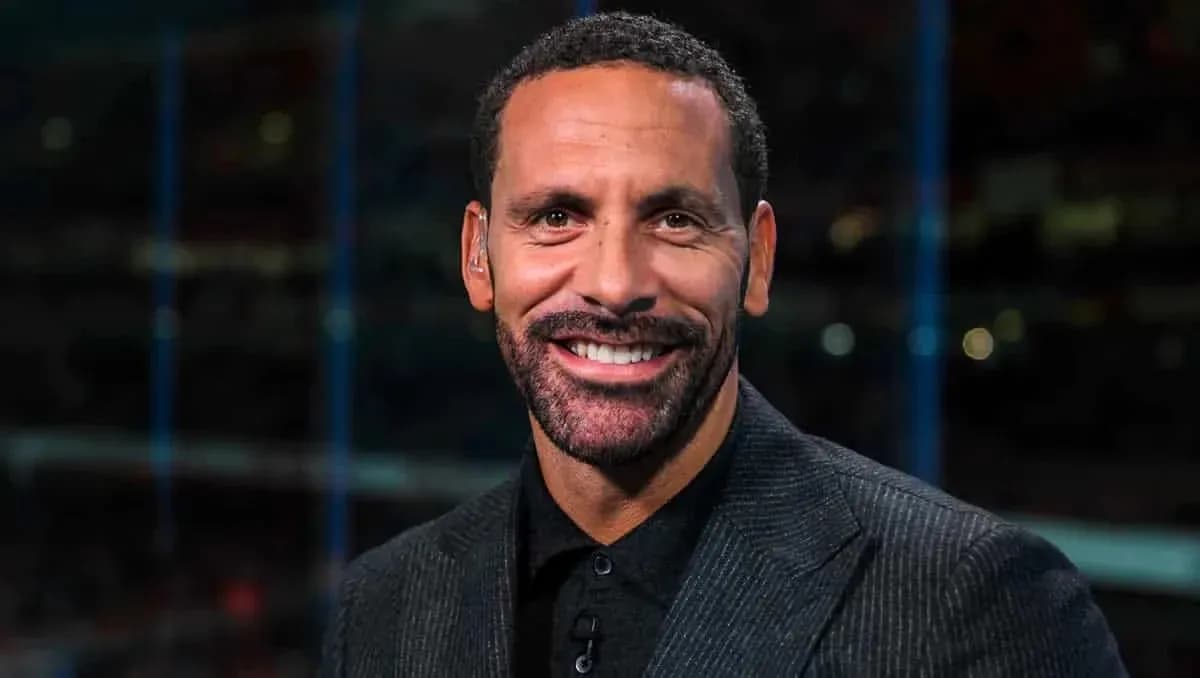 Sport commentator smiling in studio setting Sport commentator smiling in studio setting