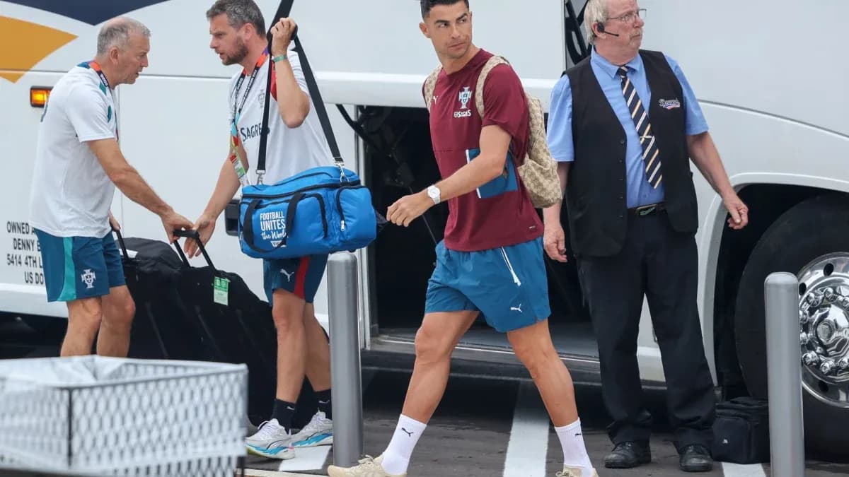 Cristiano Ronaldo arriving at team bus with staff Cristiano Ronaldo arriving at team bus with staff
