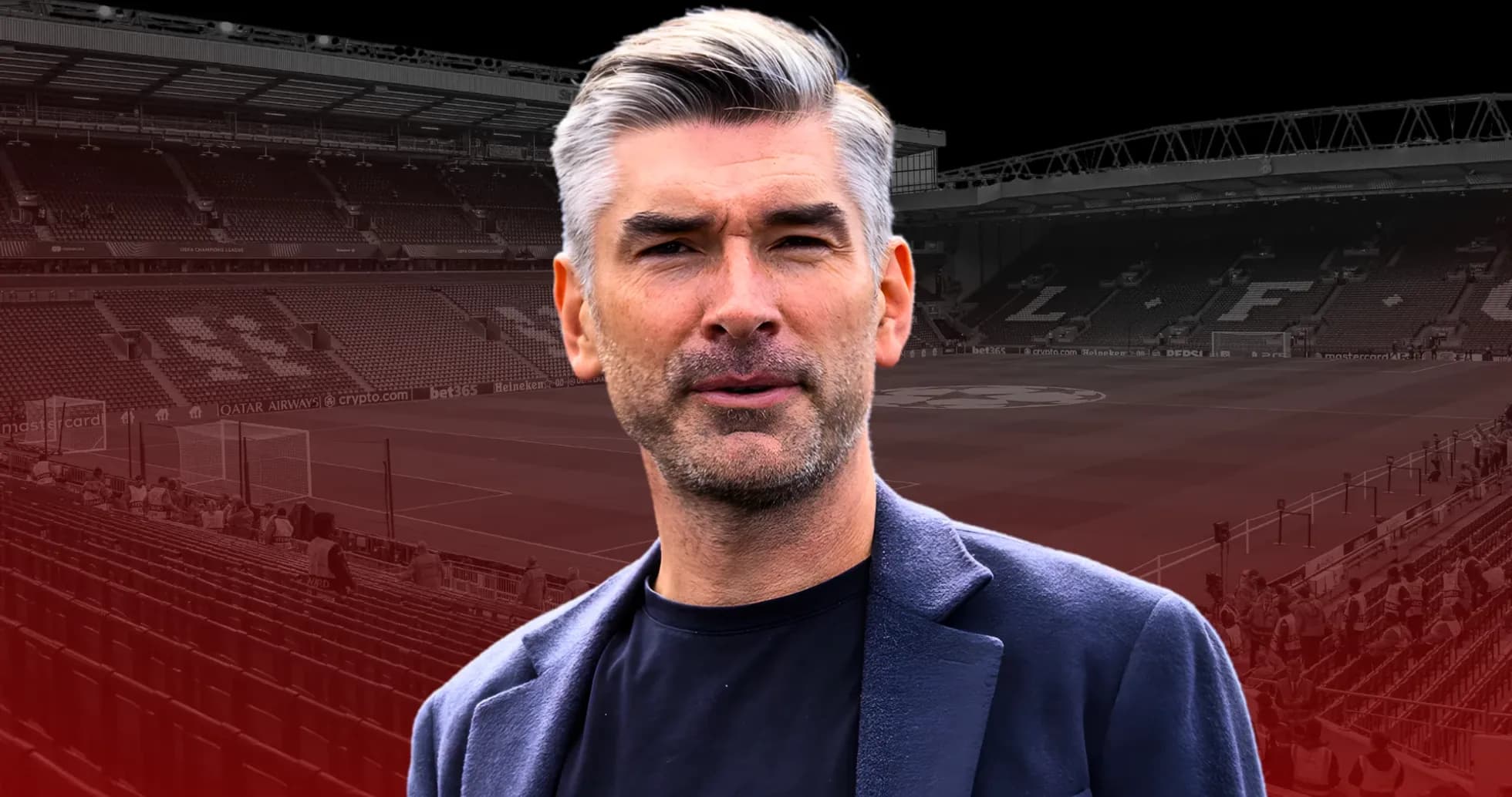Man in blazer at football stadium before match Man in blazer at football stadium before match