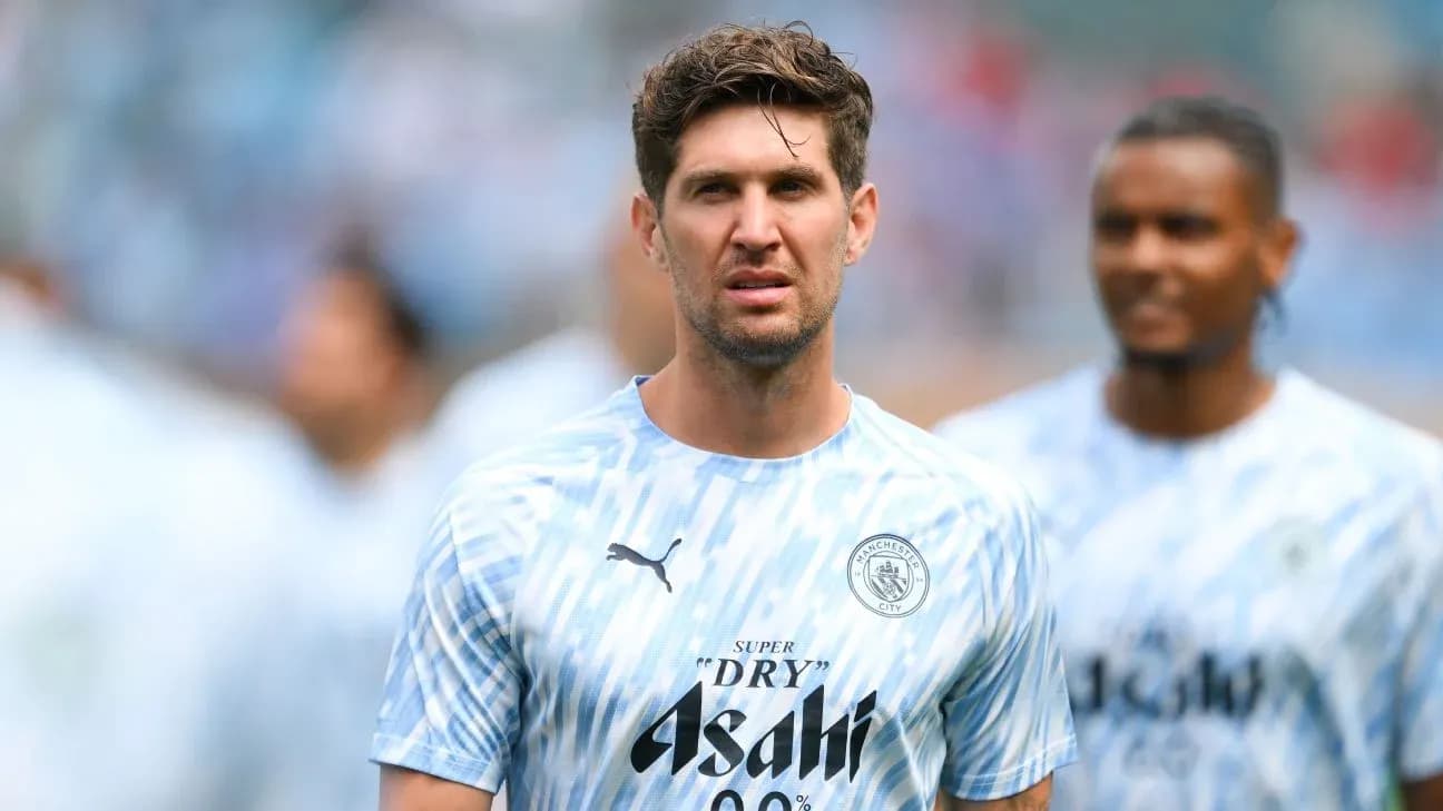 Futbolchi mashg'ulotida, Manchester City formasi kiygan Futbolchi mashg'ulotida, Manchester City formasi kiygan