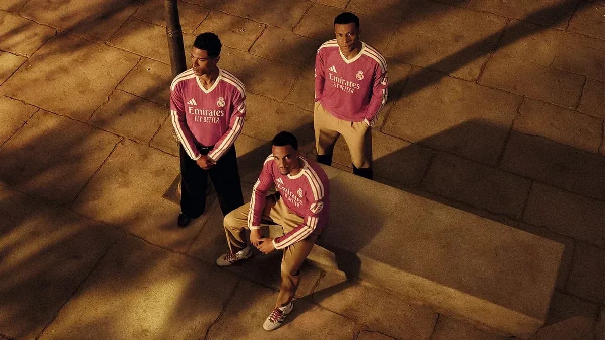 Three players posing in Real Madrid jerseys Three players posing in Real Madrid jerseys