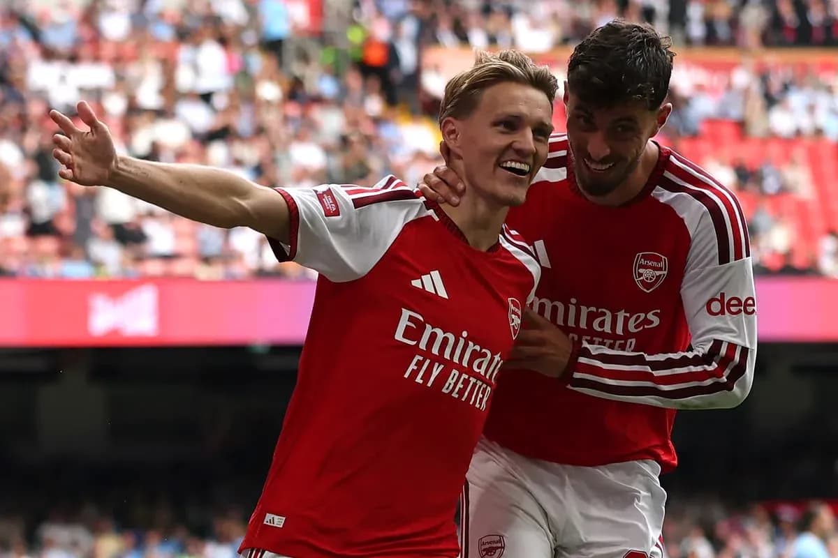 Arsenal players celebrating a goal during match Arsenal players celebrating a goal during match