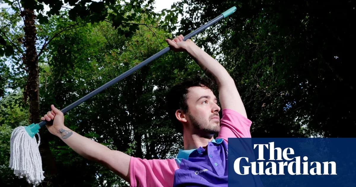 Person posing with a mop in outdoor setting Person posing with a mop in outdoor setting