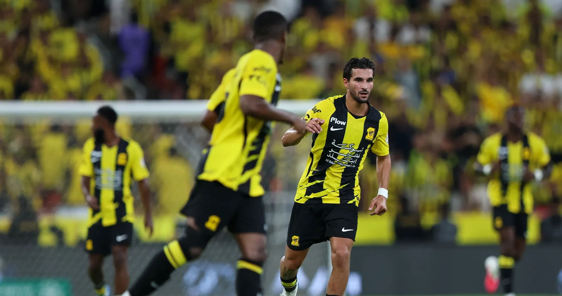 Ittihad players in action during a match Ittihad players in action during a match