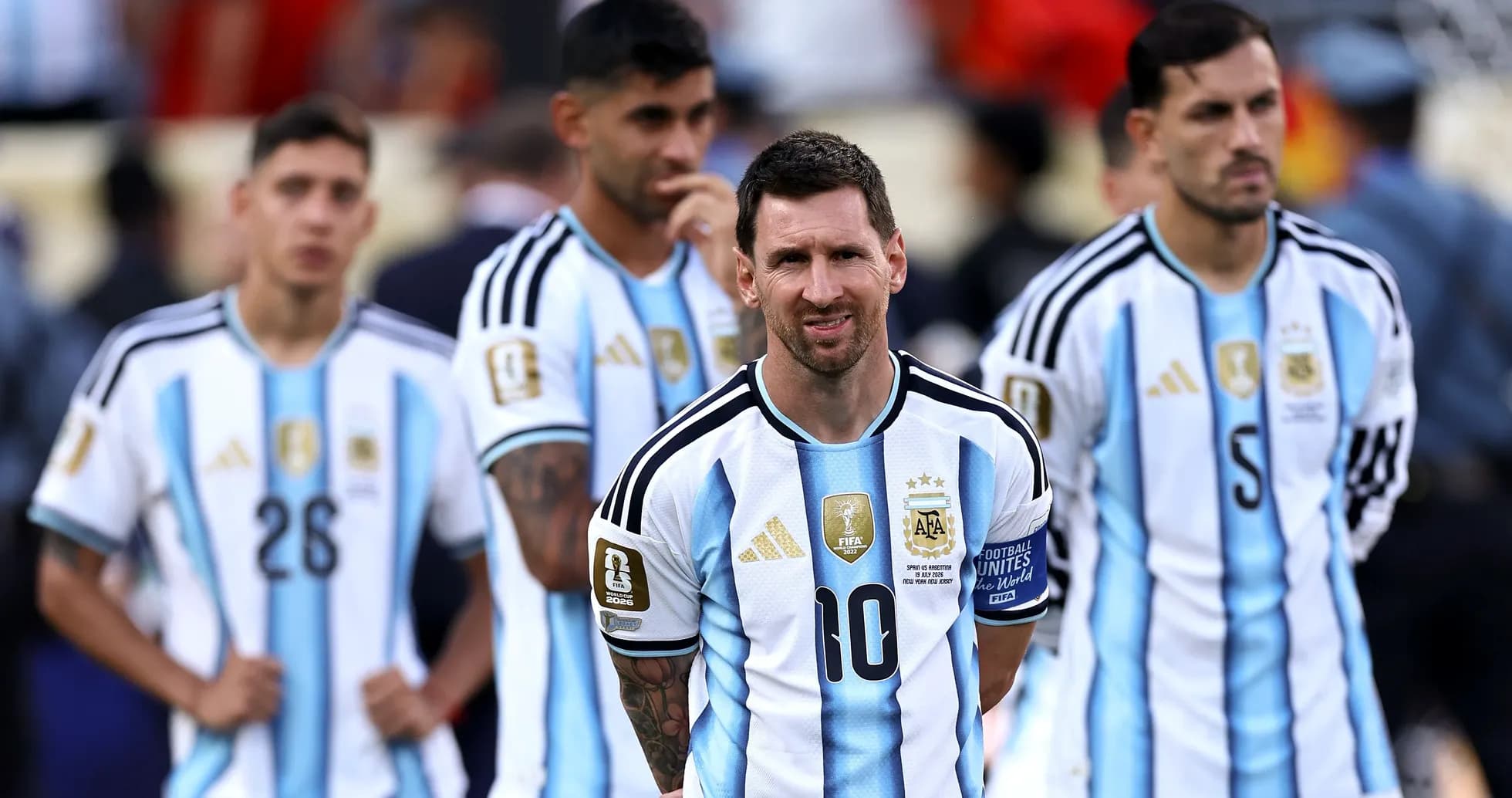 Argentina players standing during match, Messi in focus Argentina players standing during match, Messi in focus