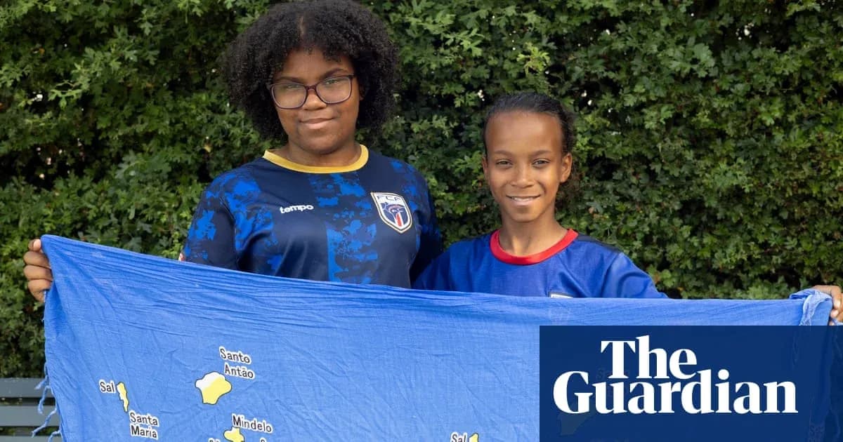Two children holding a blue map of Cape Verde Two children holding a blue map of Cape Verde