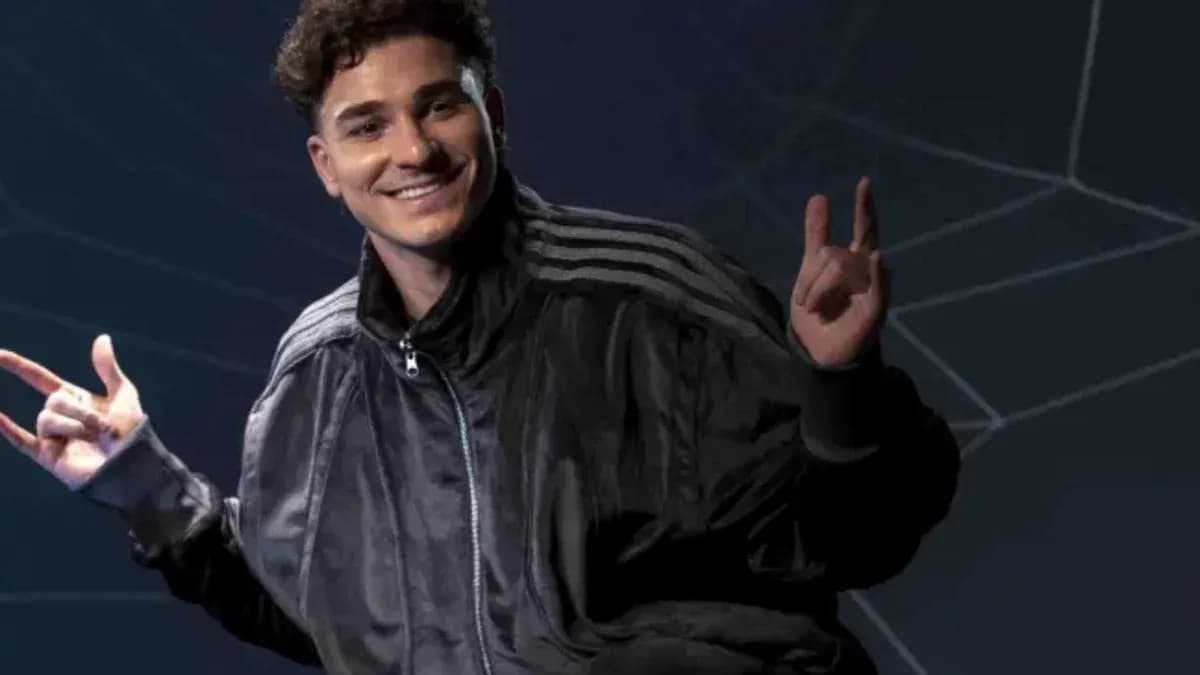 Young man posing with peace sign and smile Young man posing with peace sign and smile