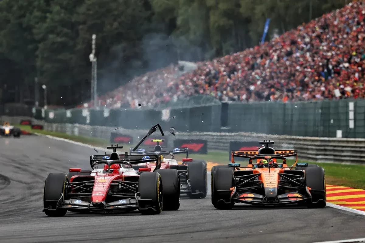 Formula 1 cars colliding on track during race Formula 1 cars colliding on track during race
